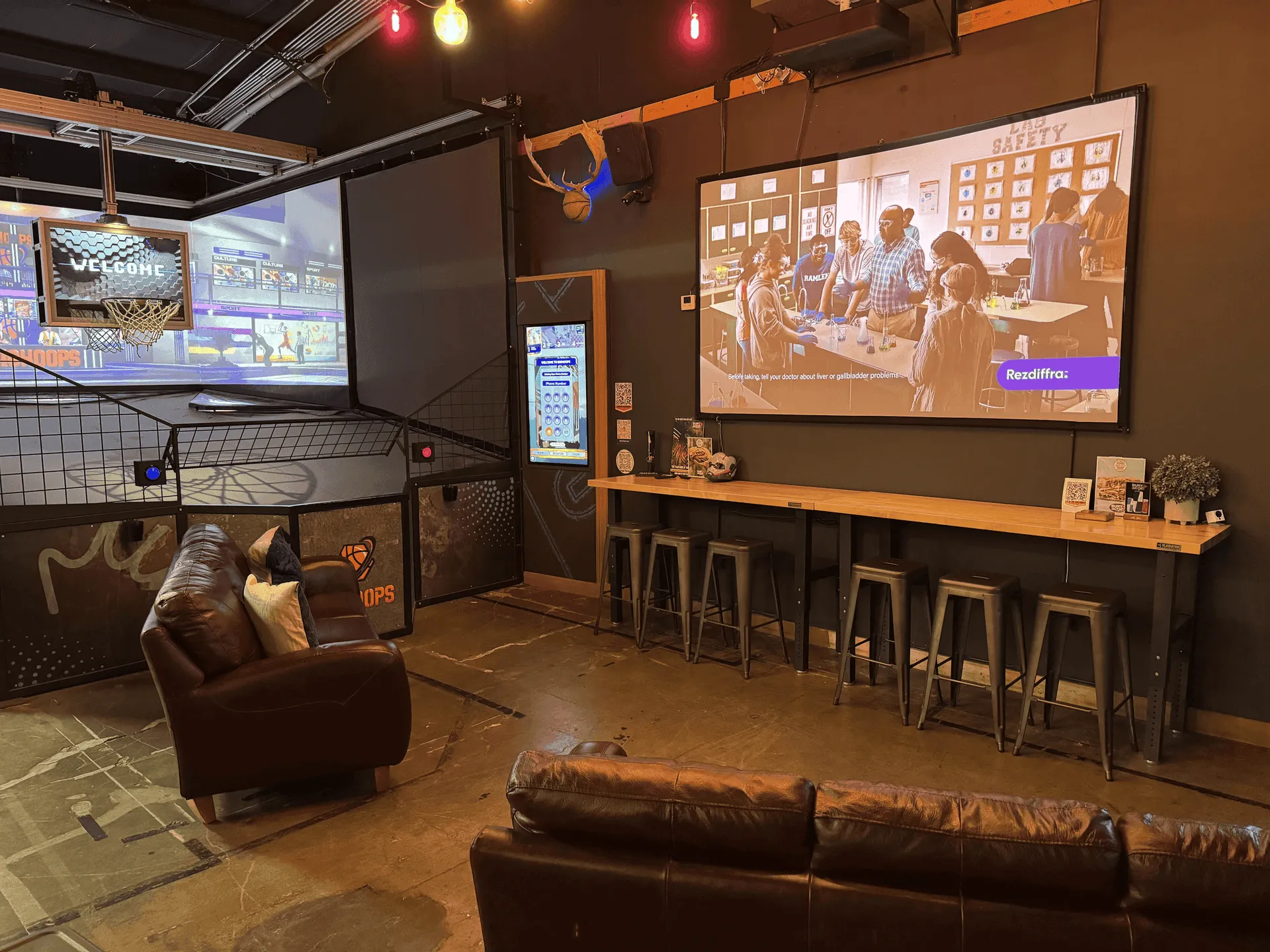 70 inch projector for watch parties at Bury the Hatchet