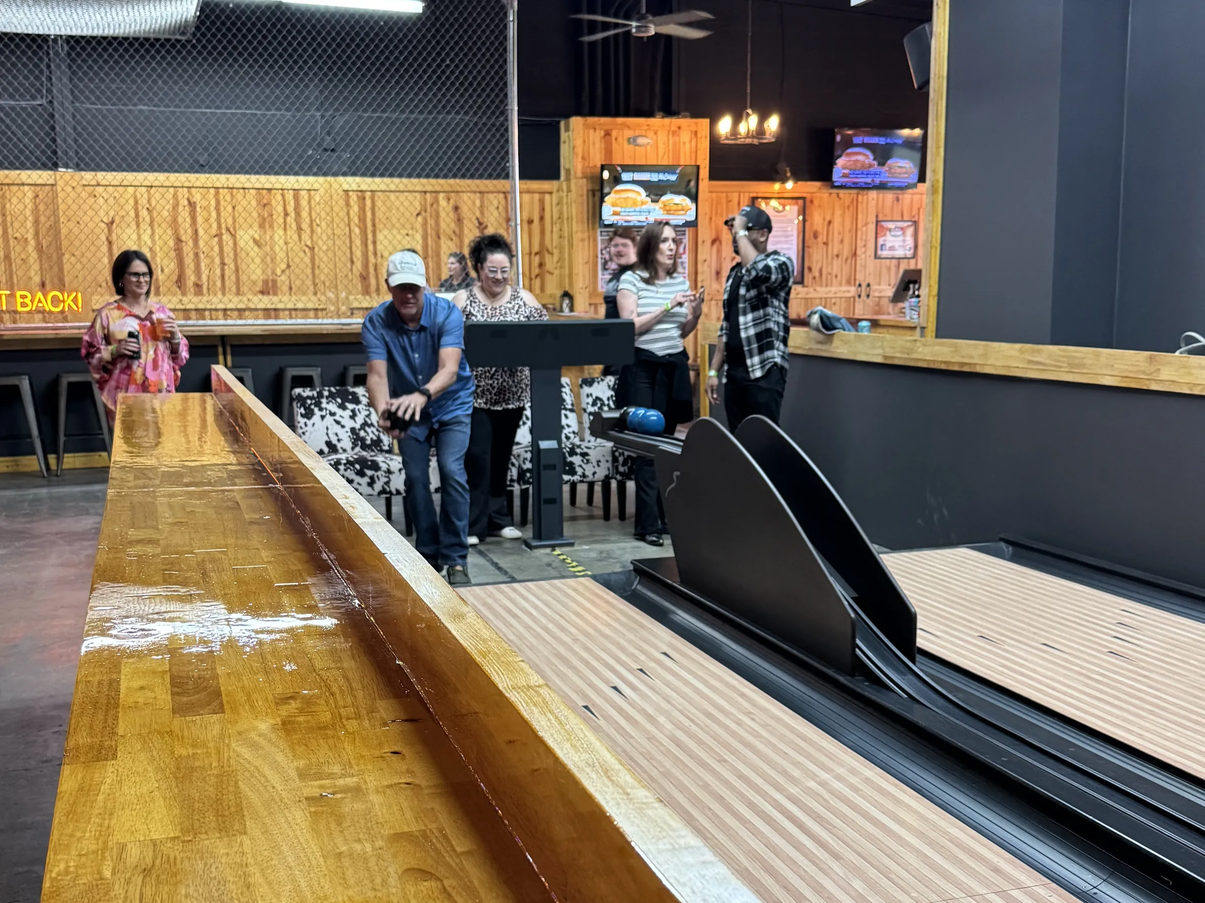 Guests duckpin bowling at Electric Sports Social